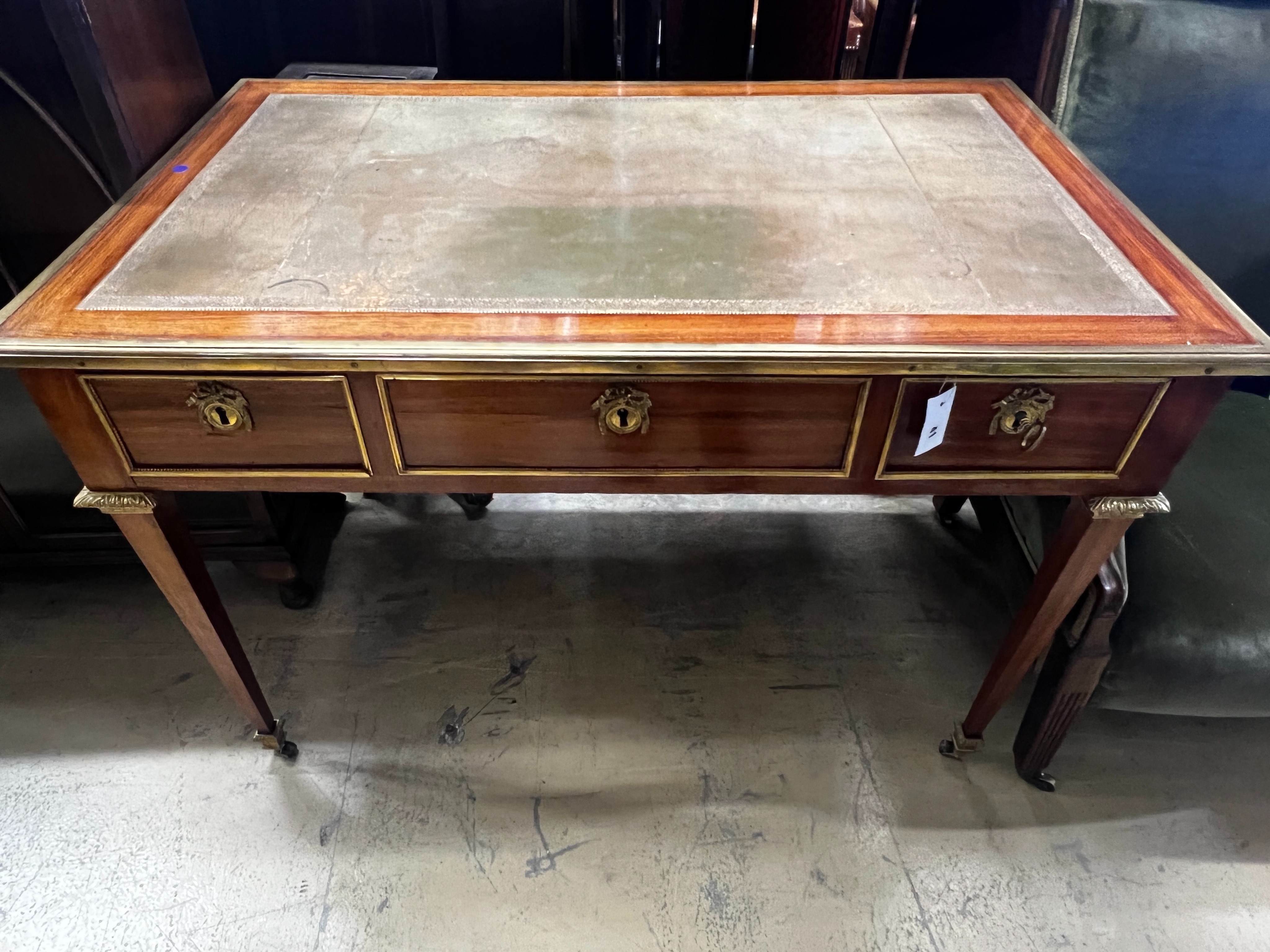 An early 20th century French gilt metal mounted kingwood bureau plat, width 113cm, depth 70cm, height 78cm